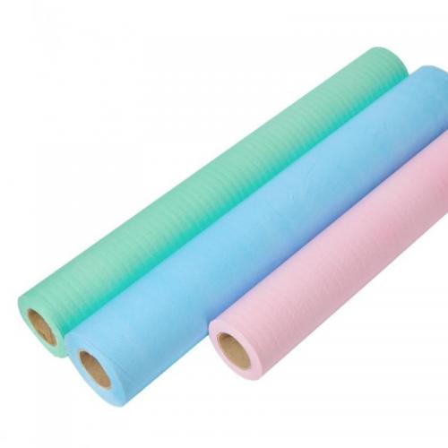 China Laminated Paper Film Roll Degradable Examination Bed Sheet Paper Film Roll Couch/Table Pad Manufacturer